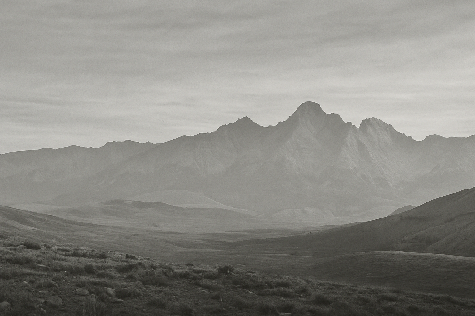 Western mountain range background representing rugged industrial service region